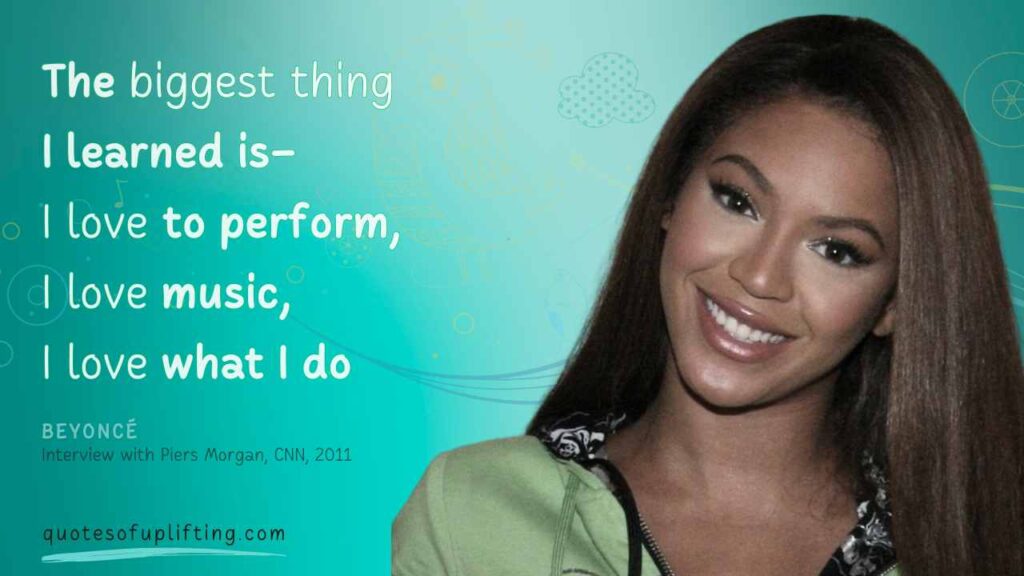 Beyonce smiling in green outfit and open and long hairs with an inspirational quote